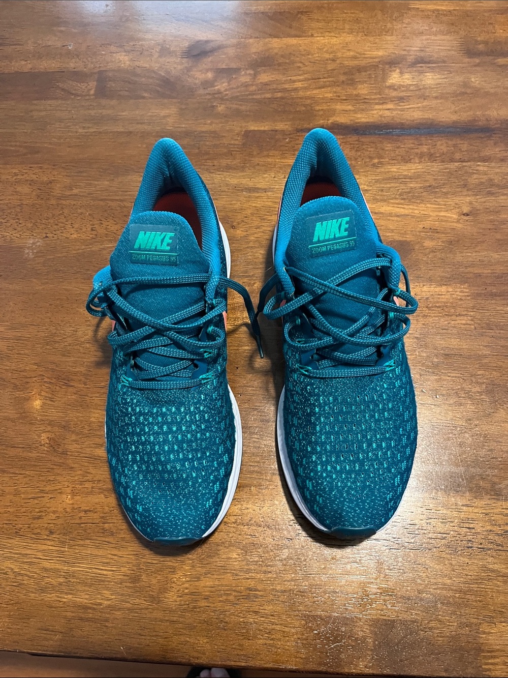 Nike Pegasus running sneakers. Teal and Punch swoosh size 12